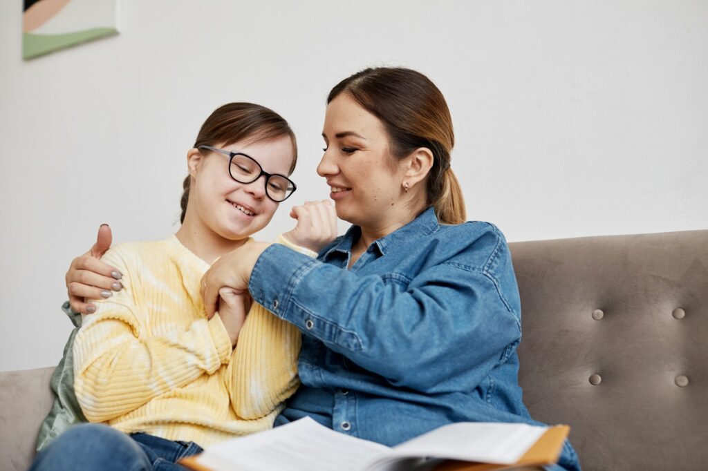 Girl With Down Syndrome Reading Book